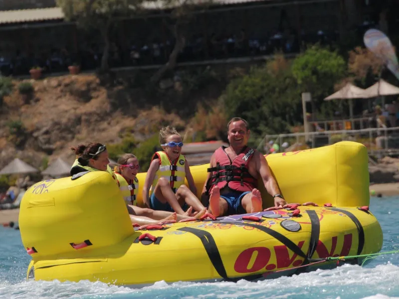 A family enjoying a thrilling sofa ride at St. Nicholas Watersports!